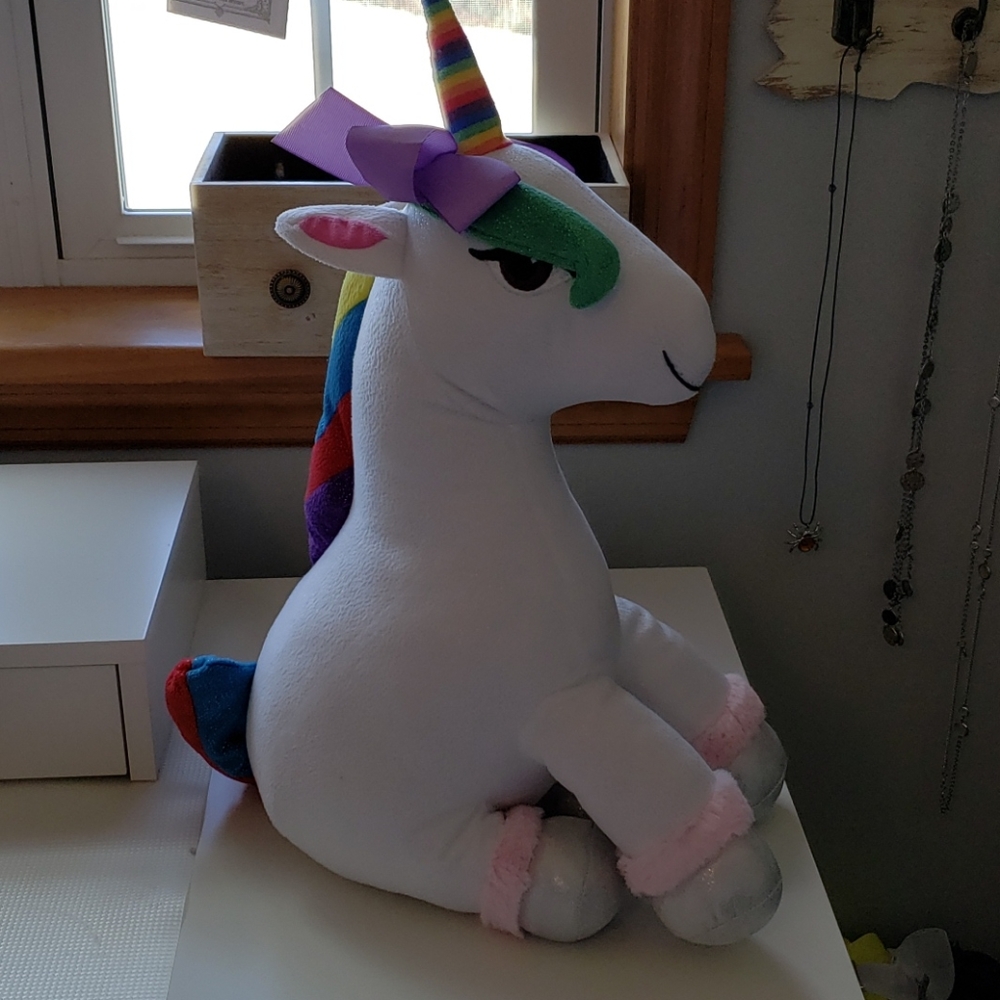 Jojo Siwaa stuffed unicorn